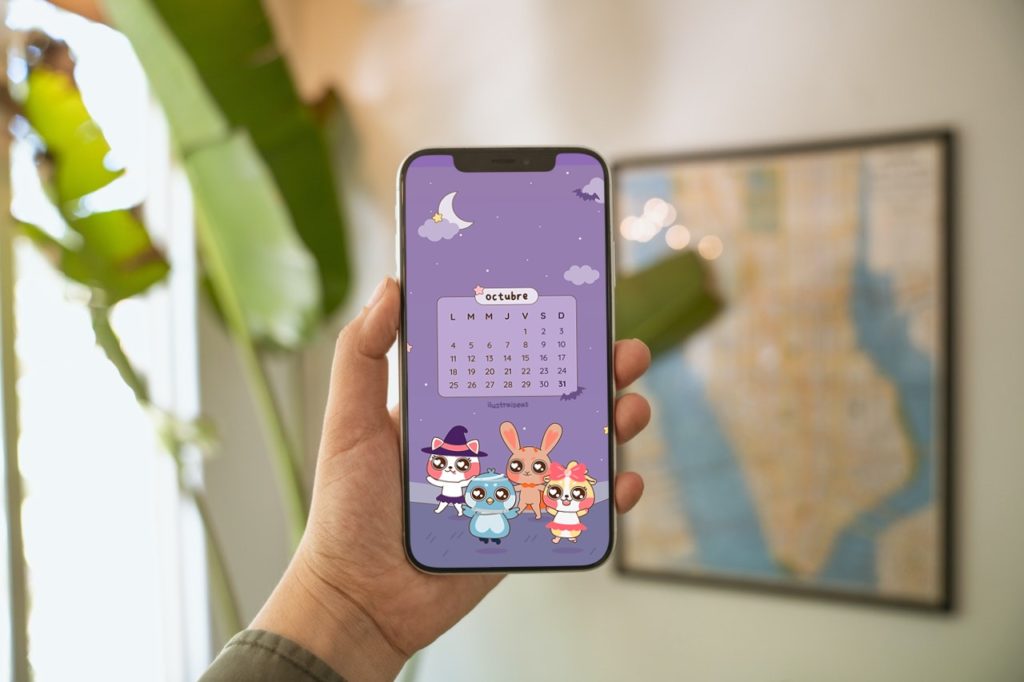un celular con el calendario de octubre